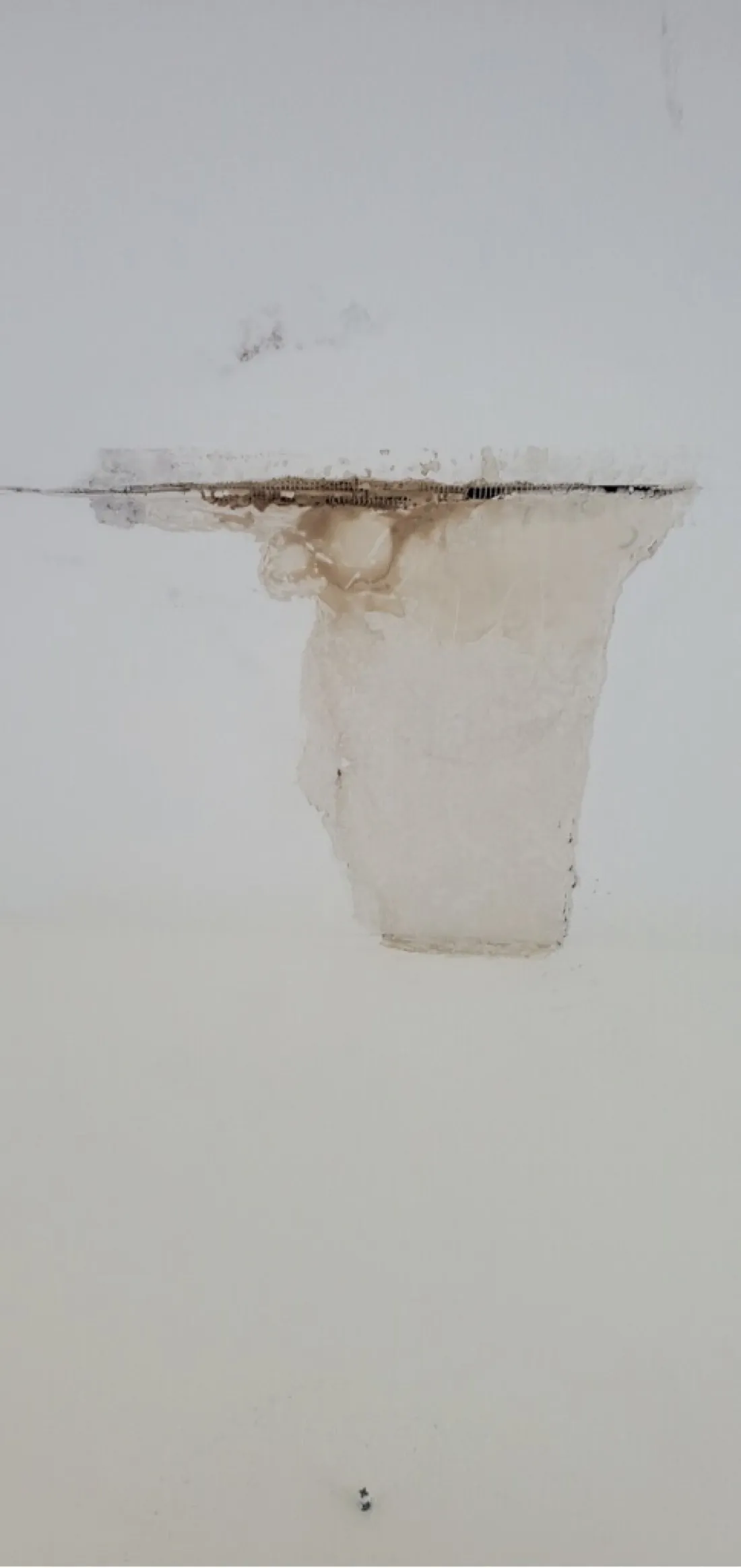Drywall patch and skim coat repair completed on ceiling with seamless blending — Zomg The Handyman