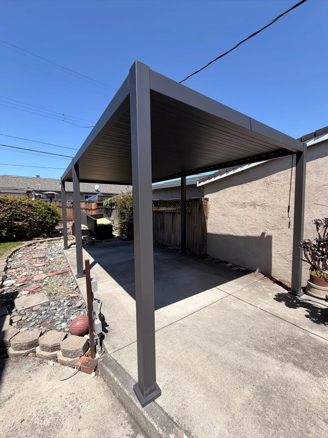 Outdoor TV mounted horizontally on grass lawn installation area. — Zomg The Handyman