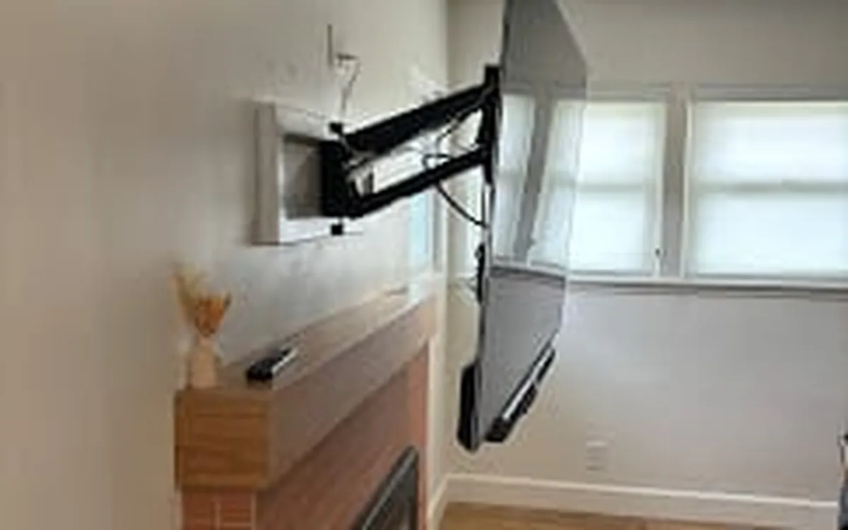 Articulating mount pulling the TV out from the wall