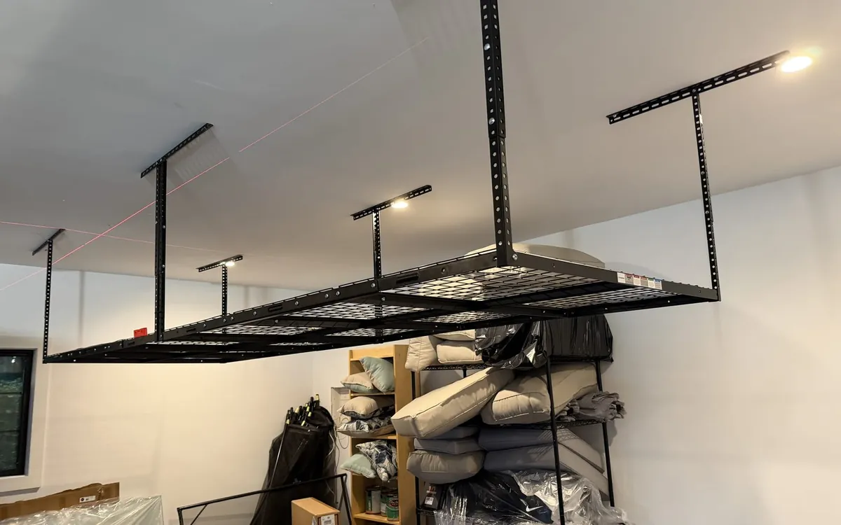 Overhead garage storage racks installed by Zomg