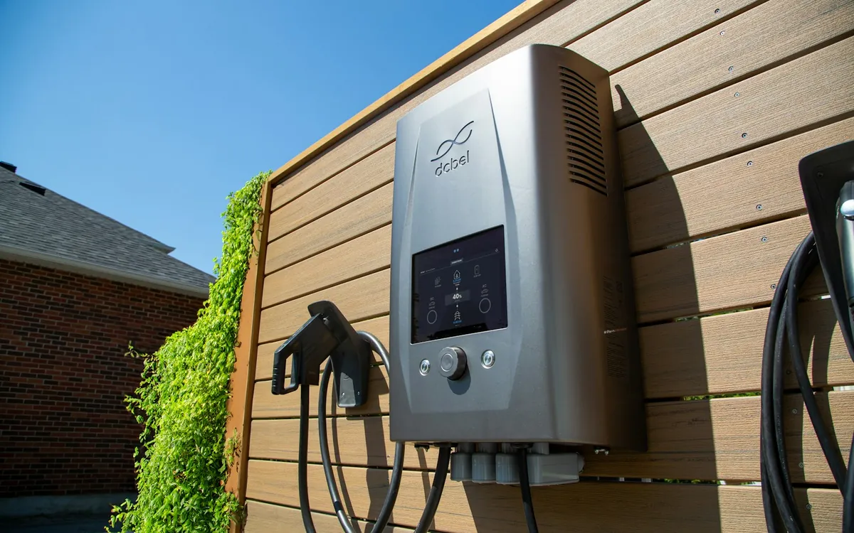 Level 2 EV charger mounted on a garage wall