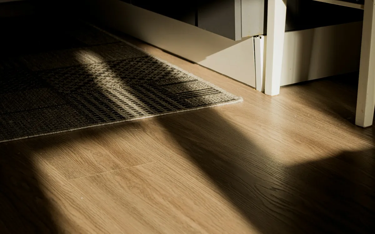 Wood look flooring with a rug