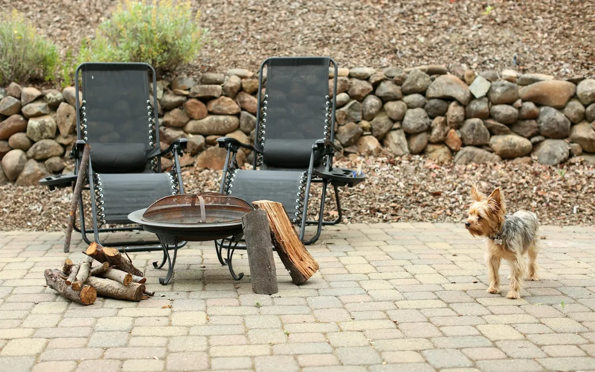 Chairs around a fire pit on a brick patio