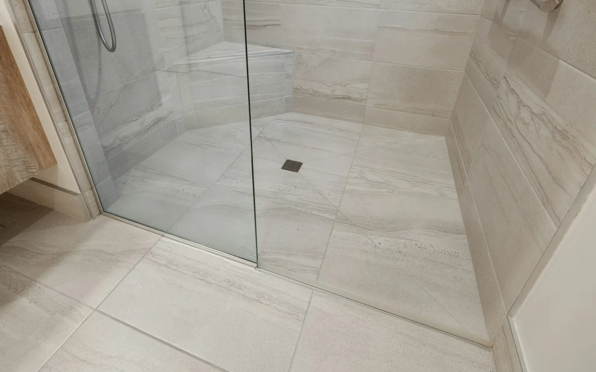 White tiled bathroom floor