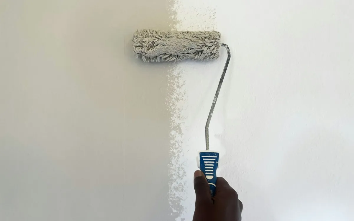 Rolling paint on an interior wall