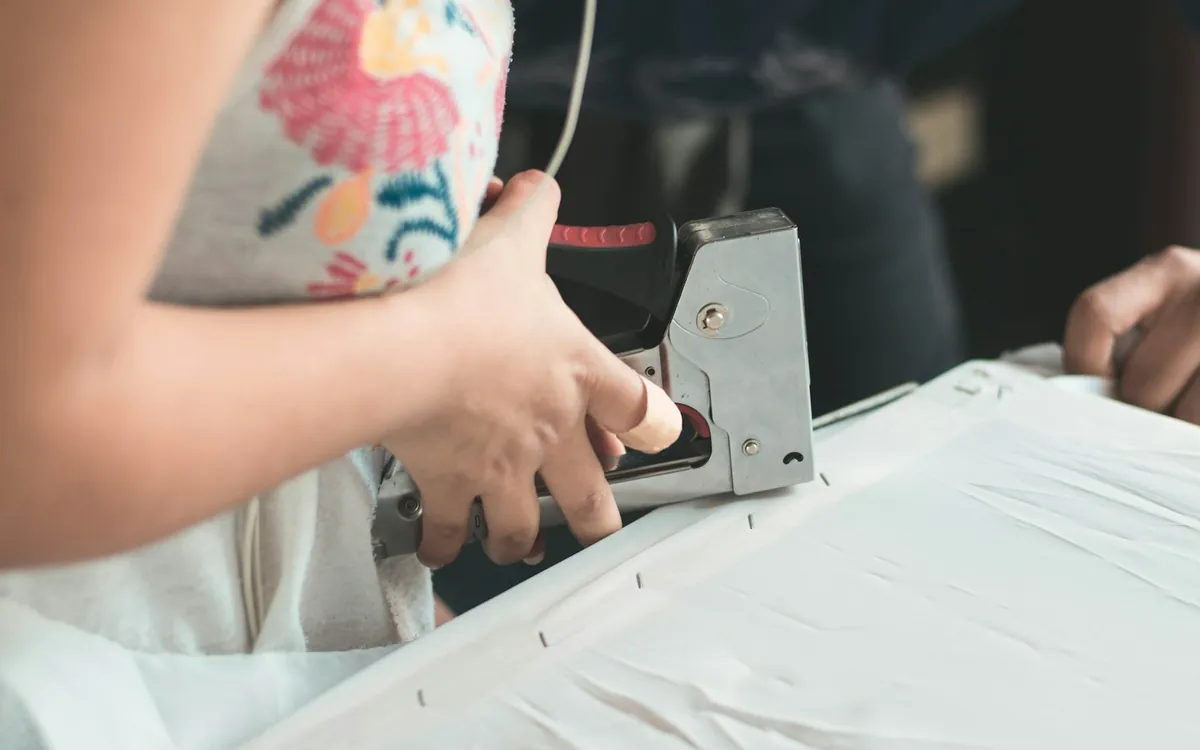 Staple gun in hand