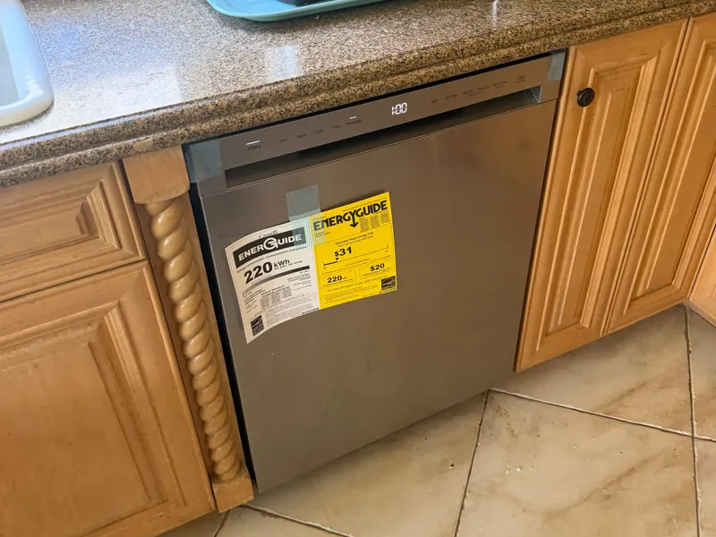 Dishwasher installed under a kitchen counter by Zomg The Handyman